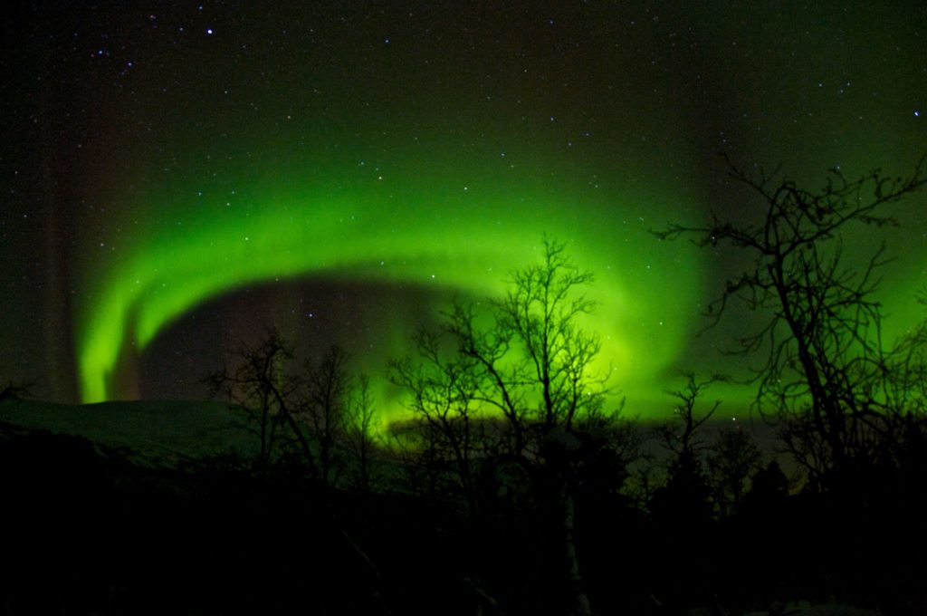 Nordlys over fastlandet, Tromsø. Foto: Eimund Bakke